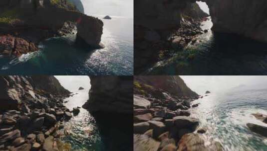 FPV穿越机无人机航拍海浪冲击海岛海岸日落高清在线视频素材下载