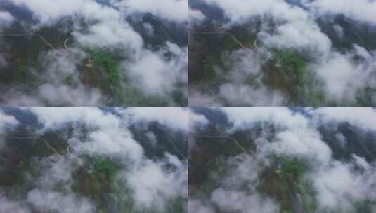 航拍俯瞰云海和高山大地高清在线视频素材下载