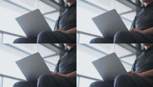 商务男子出差途中机场用笔记本电脑移动办公高清在线视频素材下载