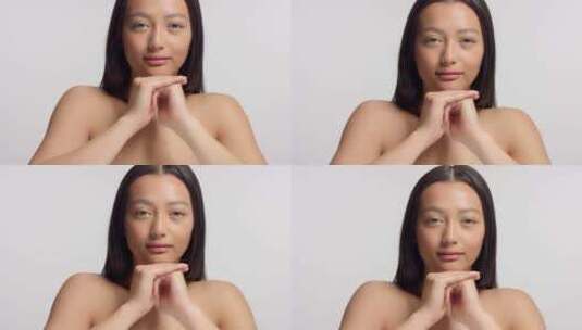 混合种族亚洲模型在工作室美容拍摄高清在线视频素材下载