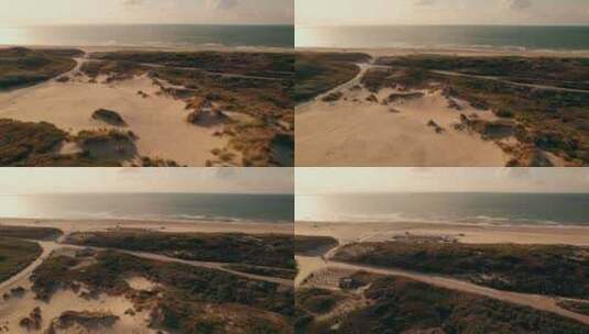 鸟瞰接近海牙日落时分的基杜恩海滩高清在线视频素材下载