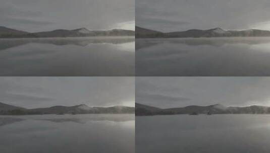 航拍清晨雾气的湖面高清在线视频素材下载