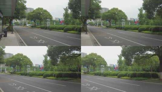 城市大道绿树成荫实拍交通高清在线视频素材下载
