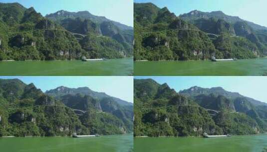 船舶行驶在绿水青山的长江三峡西陵峡高清在线视频素材下载