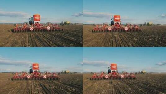 拖拉机在田里播种小麦高清在线视频素材下载