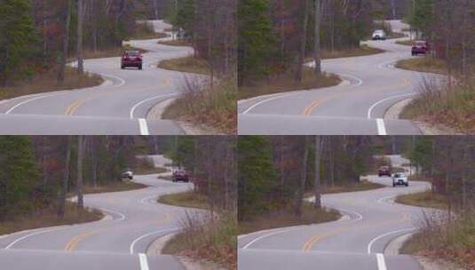 汽车在弯曲蜿蜒的道路上行驶高清在线视频素材下载