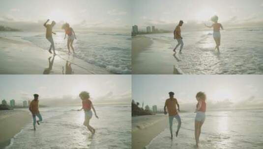 情侣在沙滩上玩耍高清在线视频素材下载