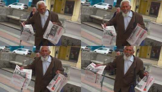 老人在街道卖报纸高清在线视频素材下载