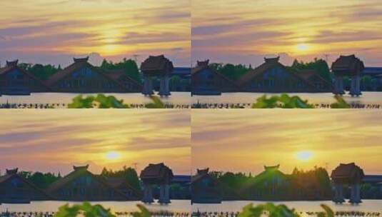 湖面水上建筑夕阳彩霞高清在线视频素材下载