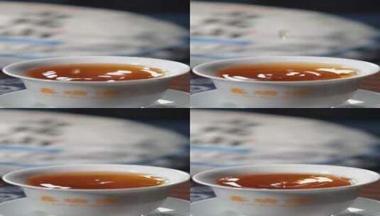 【三花视频】往茶杯里滴水 水滴 倒茶高清在线视频素材下载