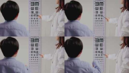 医生给小男孩测视力高清在线视频素材下载