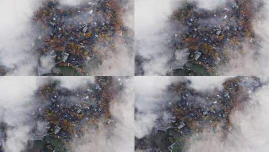 俯瞰云雾中的银杏村落高清在线视频素材下载