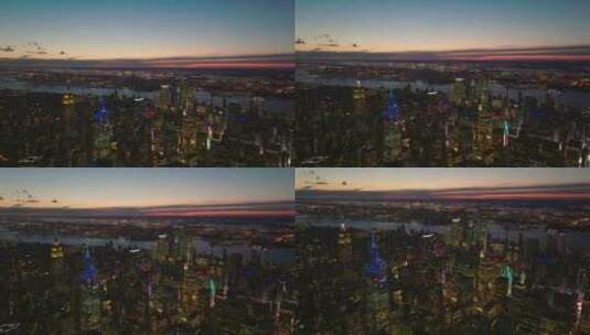 晚间市中心摩天大楼令人屏息的空中全景镜头高清在线视频素材下载