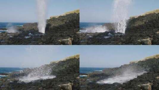 水从海边的岩石间直接喷向空气高清在线视频素材下载