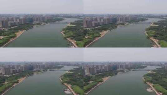 竖版航拍河南漯河城市绿化植物沙澧公园高清在线视频素材下载