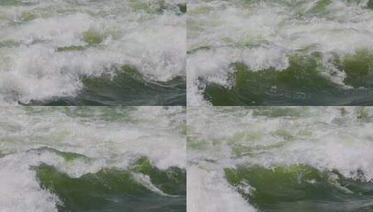 探寻自然：清澈江水与海水波浪冲击的特写高清在线视频素材下载