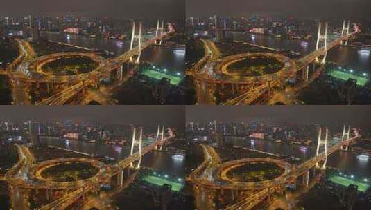 航拍上海南浦大桥螺旋引桥夜景车流高清在线视频素材下载