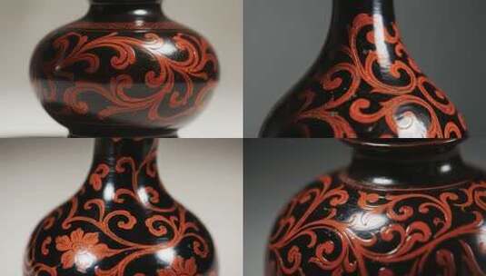 黑红花纹陶瓷花瓶特写高清在线视频素材下载