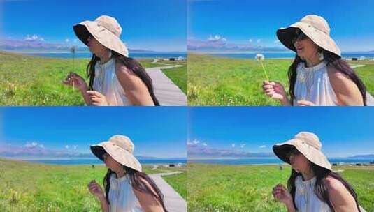 女子草原手持花草眺望远方高清在线视频素材下载