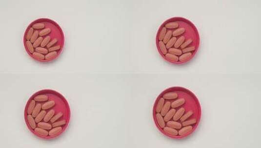 红色容器内的维生素片剂特写高清在线视频素材下载