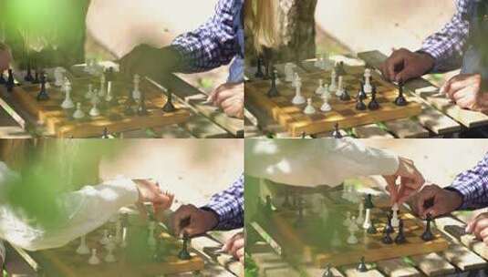 老人和年轻女人下棋高清在线视频素材下载