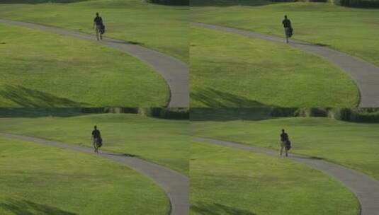 高尔夫球手沿着小路行走高清在线视频素材下载