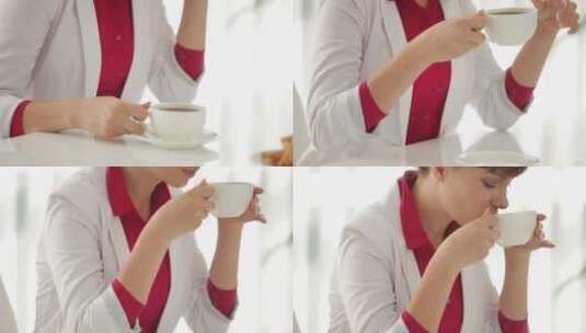 女人拿着茶杯微笑高清在线视频素材下载