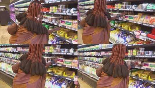 妇女在一家现代超市购物高清在线视频素材下载