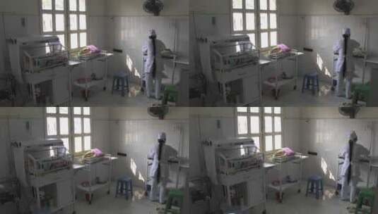 护士在医院的分娩中心照顾新生婴儿高清在线视频素材下载