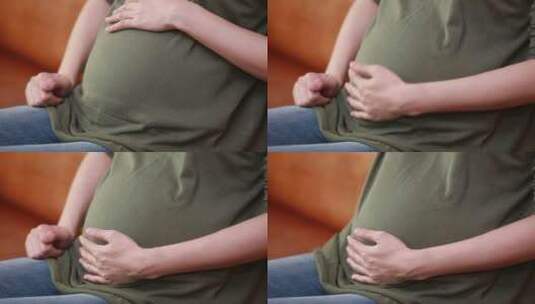 怀孕孕妇抚摸肚子高清在线视频素材下载