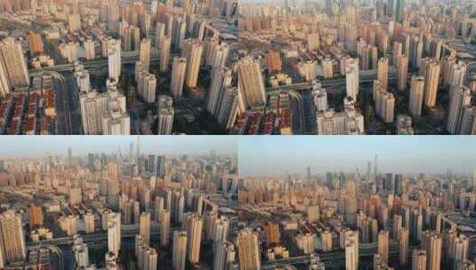 航拍日出时分的上海市区建筑群高清在线视频素材下载