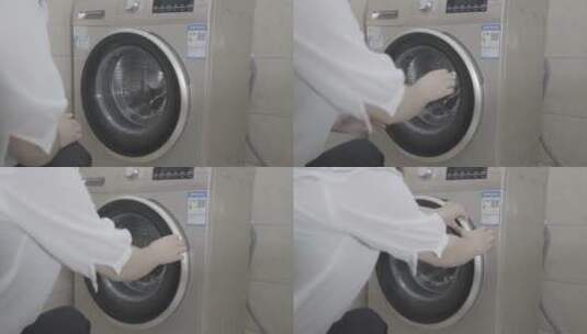 衣服放入滚筒洗衣机实拍slog2原视频高清在线视频素材下载