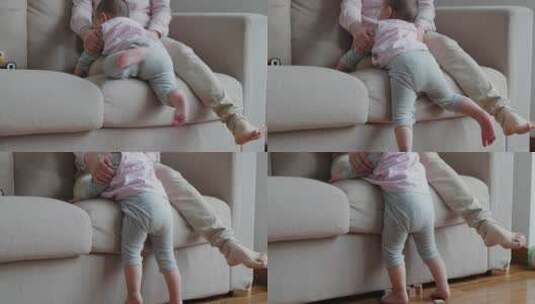 小宝宝光脚从沙发上爬下来走路高清在线视频素材下载