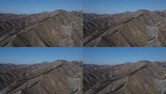 航拍大雪过后的山峰峡谷美景高清在线视频素材下载