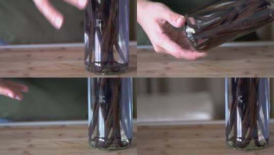 双手旋转玻璃瓶高清在线视频素材下载