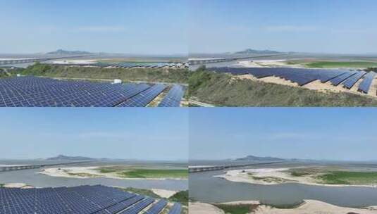 湖畔沙山上的太阳能发电航拍高清在线视频素材下载