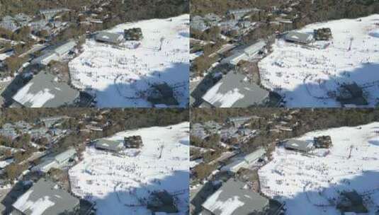 新南威尔士州斯莱德博高山雪地度假村和村庄的鸟瞰图高清在线视频素材下载
