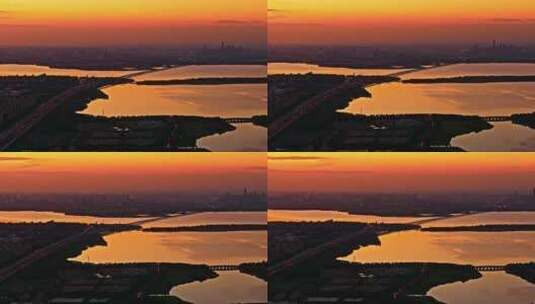 航拍苏州阳澄湖城市自然风光落日黄昏夕阳高清在线视频素材下载