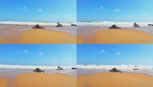 海南省万宁市山钦湾金色沙滩上奔腾的海浪高清在线视频素材下载