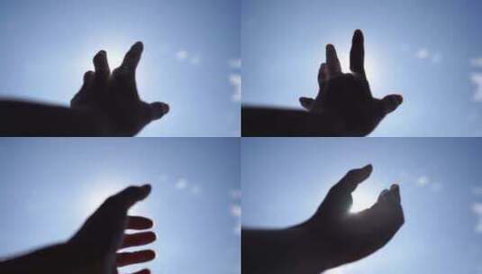 手握阳光穿过指缝手握住拳头伸手遮住太阳光高清在线视频素材下载