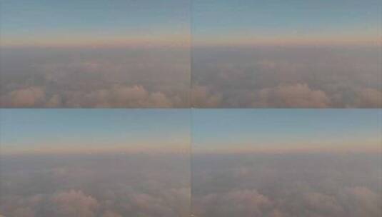 飞机窗外的云景晚霞风光高清在线视频素材下载