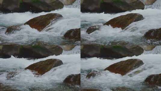 石头间的小溪流水飞溅水花高清在线视频素材下载