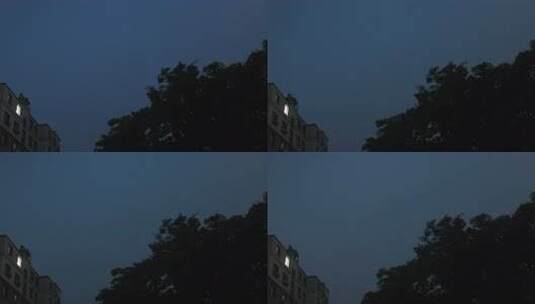 雨夜窗外的城市居民楼灯光和闪电高清在线视频素材下载