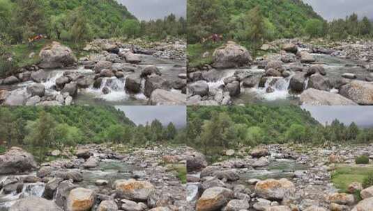 山间溪流与岩石自然景观高清在线视频素材下载
