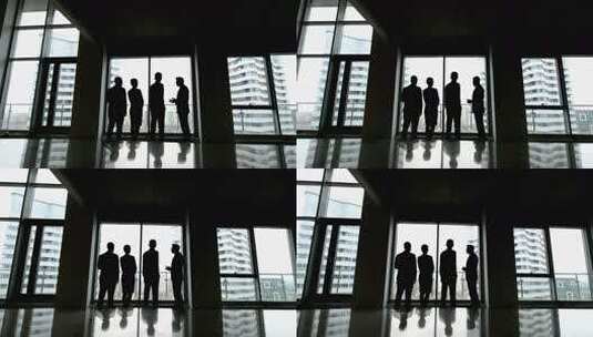 办公室内商务人士交流剪影高清在线视频素材下载