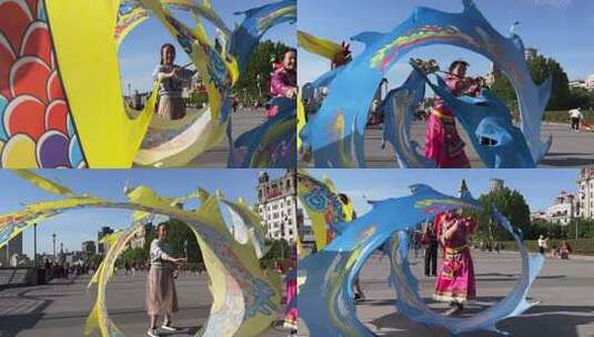 上海外滩舞动彩色飘带龙素材高清在线视频素材下载