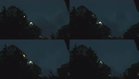 雨夜窗外的城市灯光和闪电高清在线视频素材下载