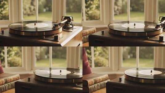 室内窗前的黑胶唱片机高清在线视频素材下载
