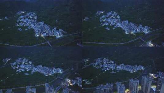 航拍广东茂名信宜钱排镇云开山下城镇夜景高清在线视频素材下载