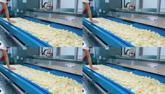 工人操作薯片生产流水线高清在线视频素材下载